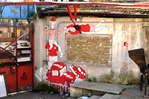 31/03/2015 Roma. Murali nella ex concessionaria Piaggio a via dello Scalo S. Lorenzo occupata da Communia, dopo lo sgombero delle ex Fonderie Bastianelli *** Local Caption ***